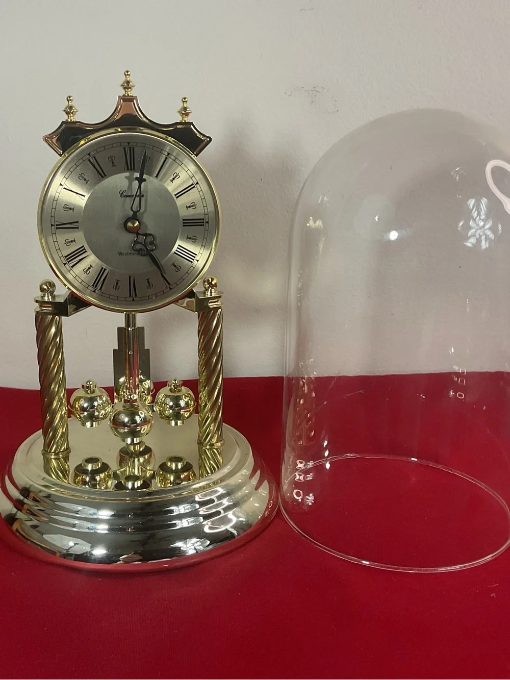 Concordia Anniversary Clock Glass Dome Quartz Rotating Pendulum Mantel Germany….